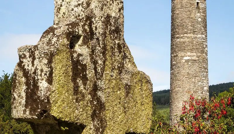 Round tower and high cross at Glendalough